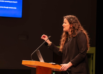 Liz Darger gives the Mary Lou Fulton Lecture in the auditorium of the JSB
